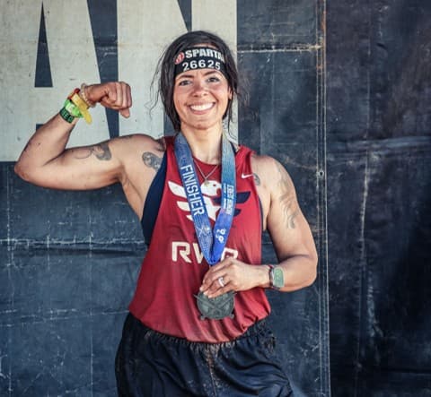 Team RWB member and "Firestarter" Vivian Morales Kolb showing her strength and joy.